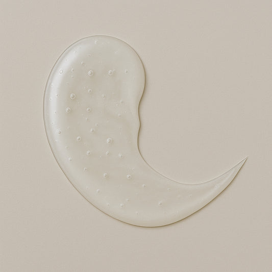 Creamy texture swatch of Coily Gurls hair product showing consistency and application
